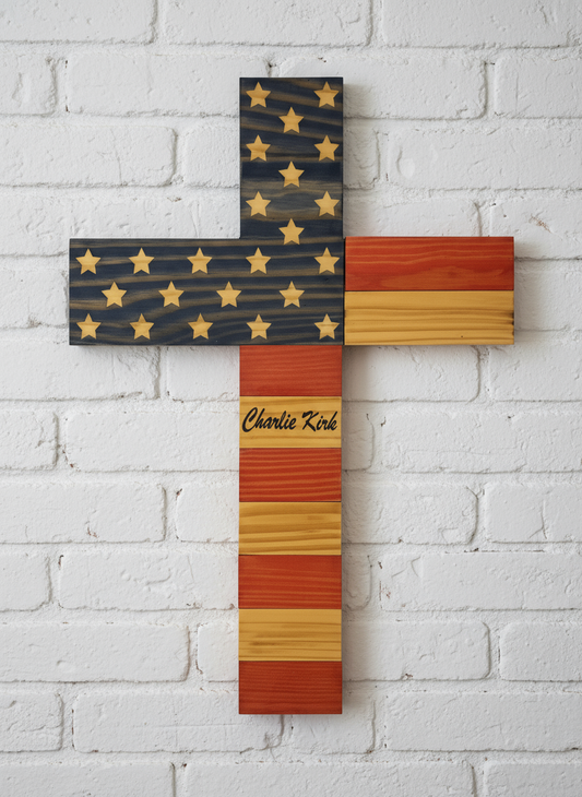 Charlie Kirk Cross White Brick Wall